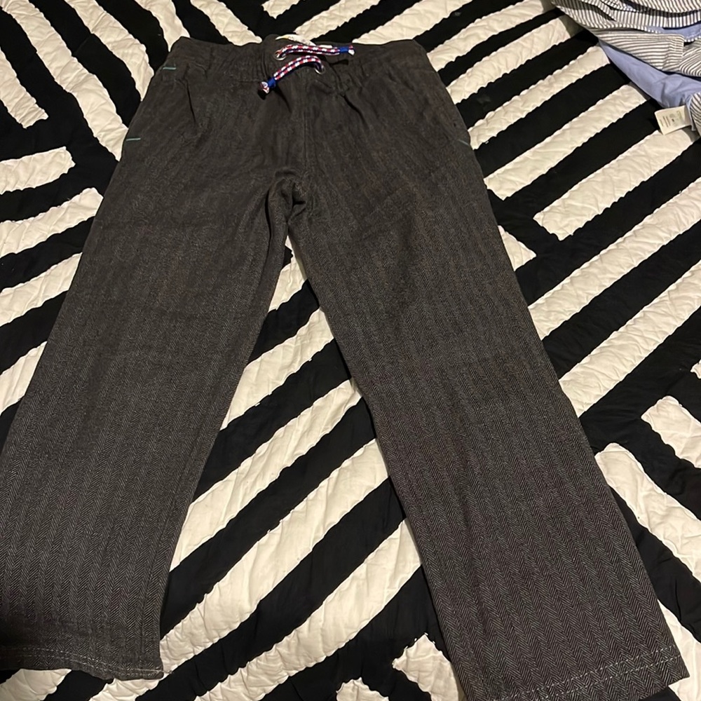 Mini Biden drawstring dress pants.